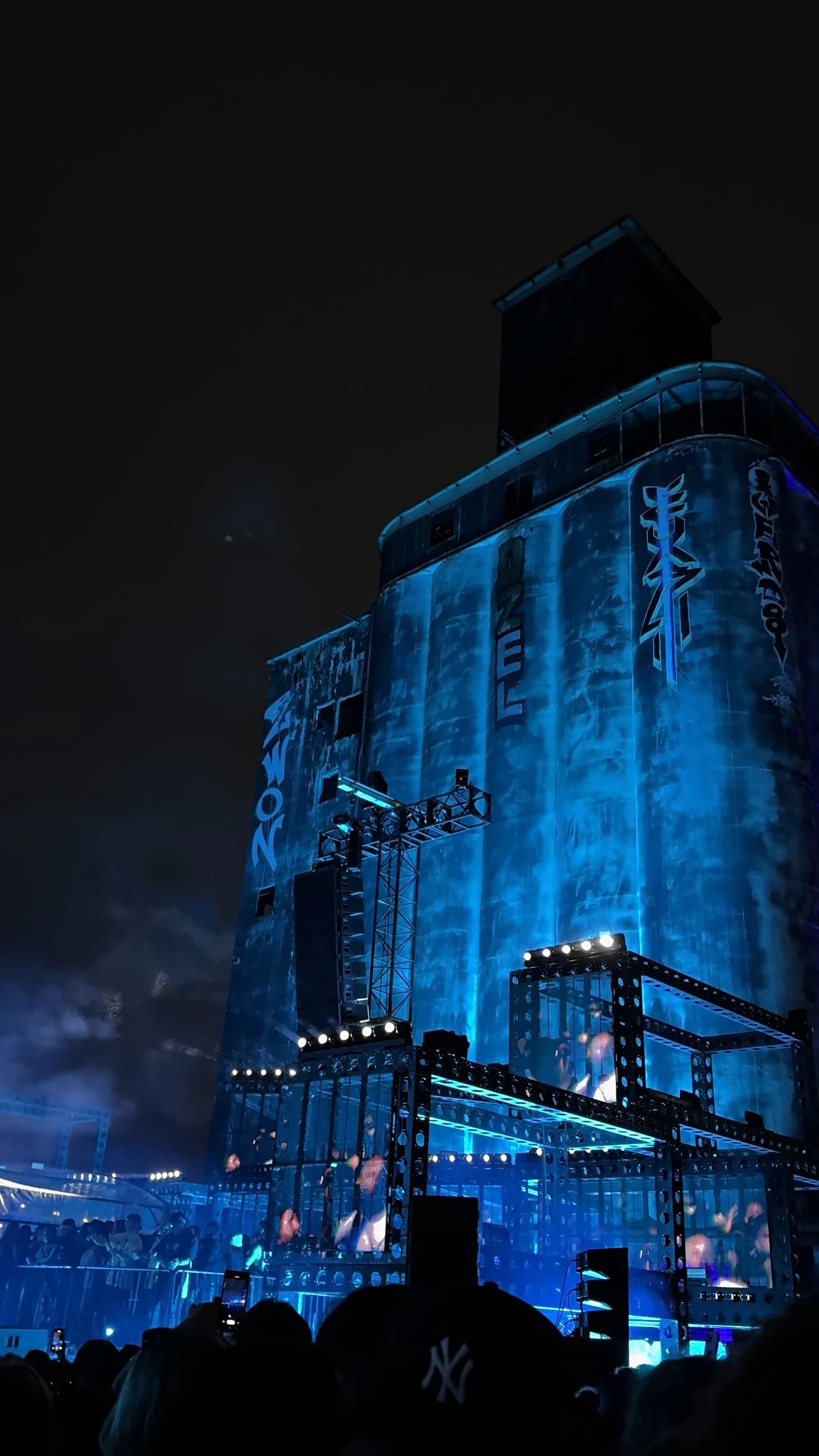 Music festival with blue industrial lighting